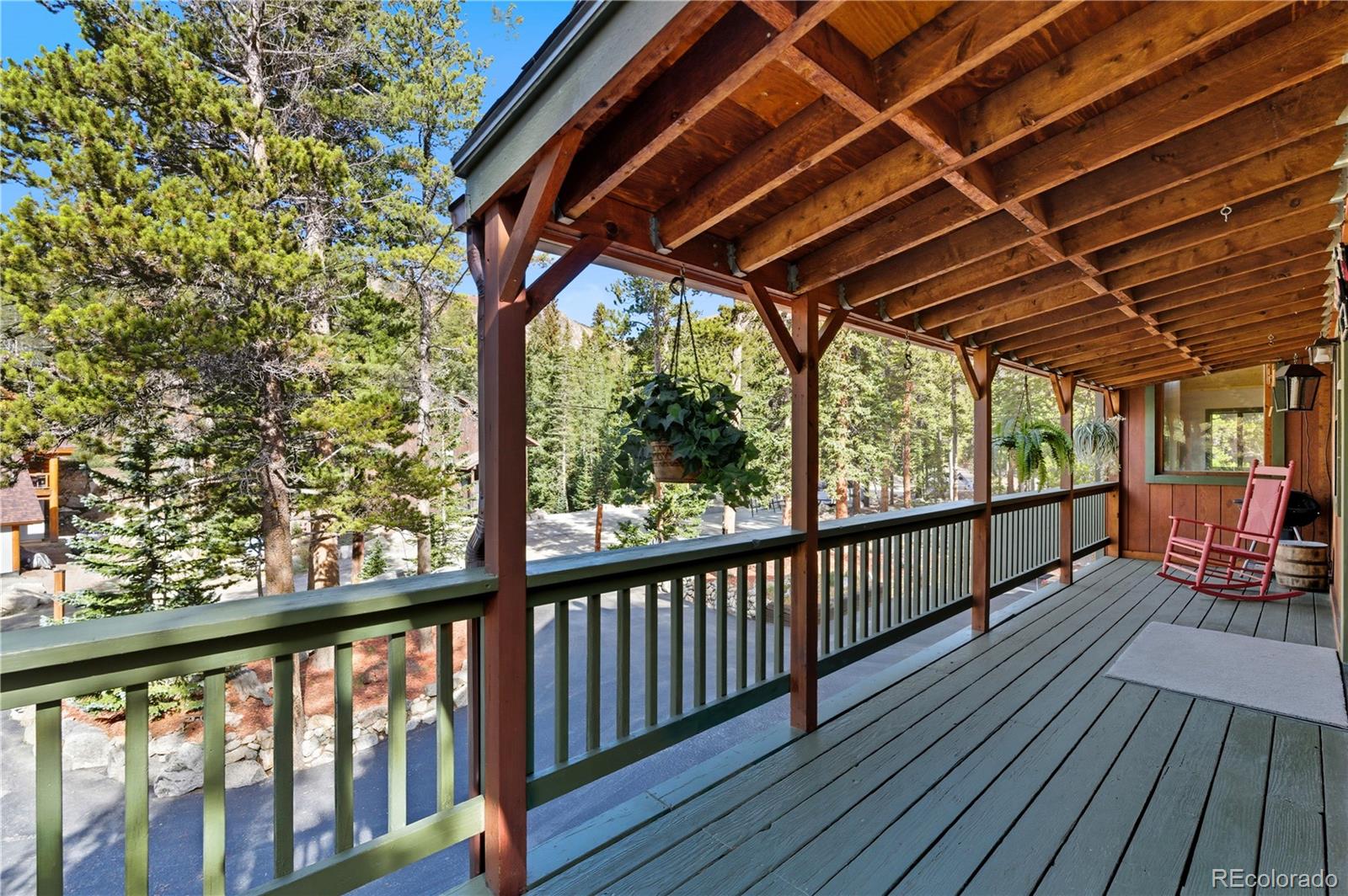 401 Lake Road Idaho Springs, CO 80452 - Photo 34 of 47 a view of porch with wooden floor in outdoor space