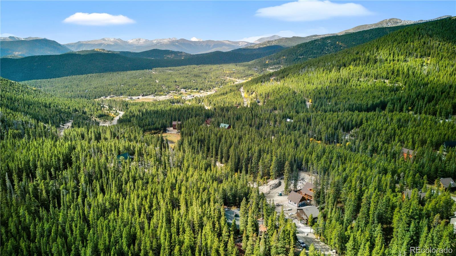 401 Lake Road Idaho Springs, CO 80452 - Photo 40 of 47 a view of lake with lush green hillside