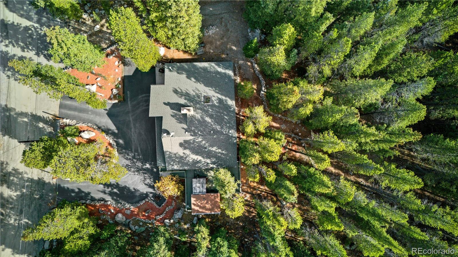 401 Lake Road Idaho Springs, CO 80452 - Photo 44 of 47 an aerial view of a house with yard