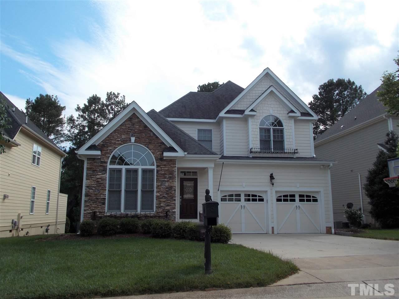 12233 Beestone Lane Raleigh, NC 27614 - Photo 1 of 25 a front view of a house with a yard