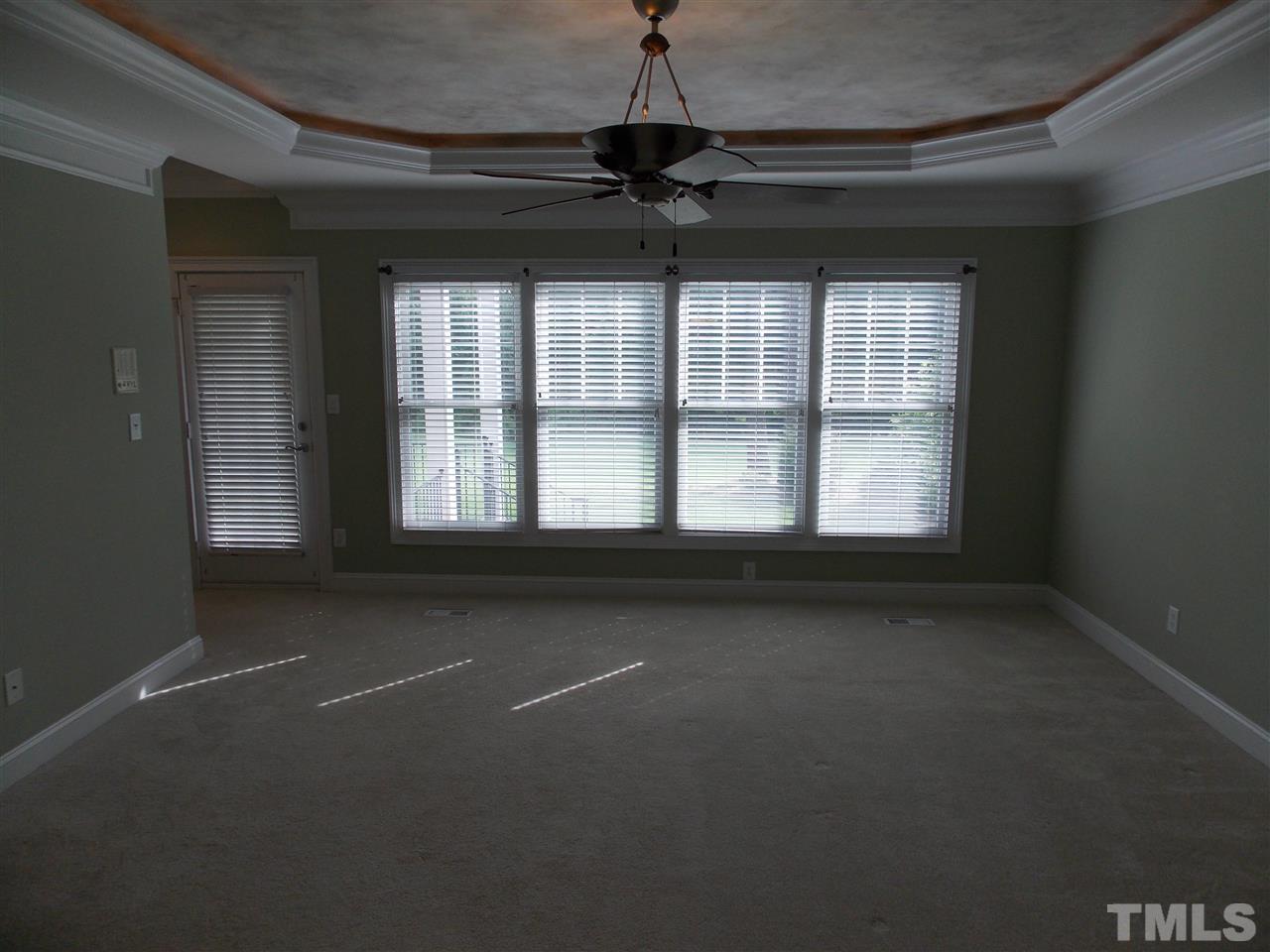 12233 Beestone Lane Raleigh, NC 27614 - Photo 11 of 25 a view of an empty room with a window