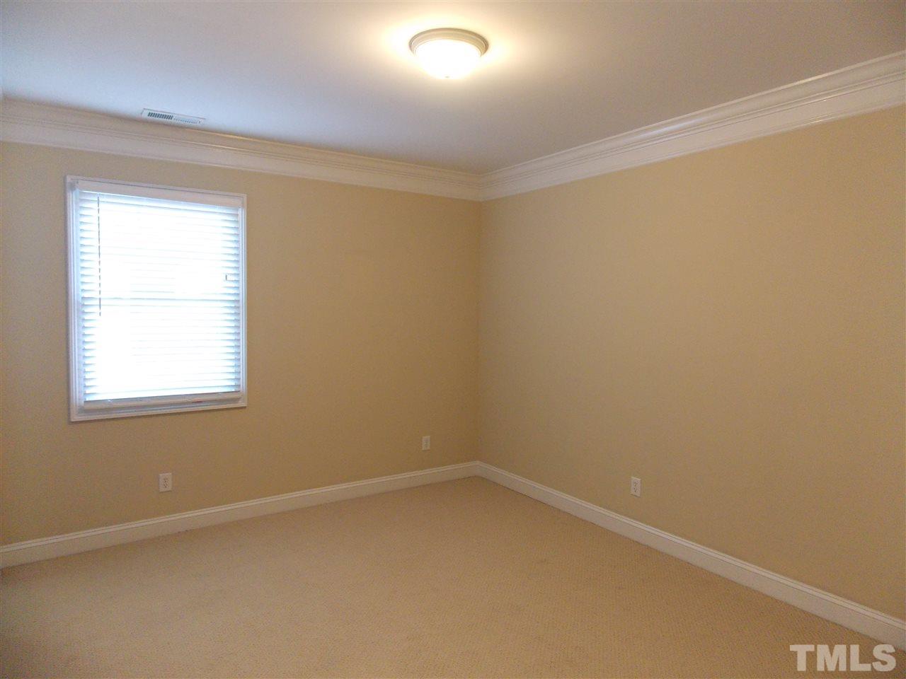 12233 Beestone Lane Raleigh, NC 27614 - Photo 15 of 25 an empty room with a window