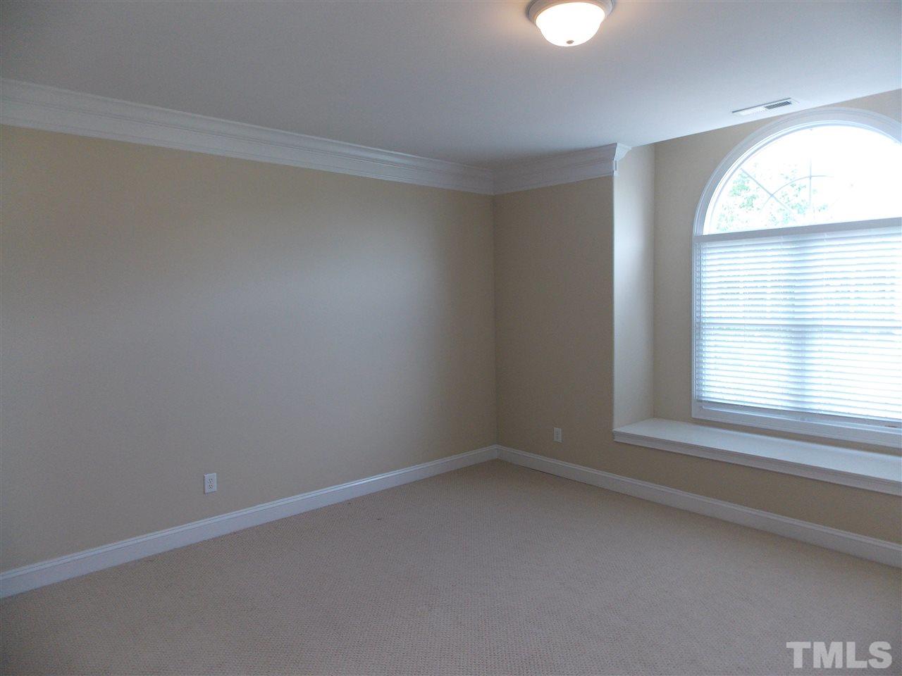 12233 Beestone Lane Raleigh, NC 27614 - Photo 16 of 25 an empty room with a window