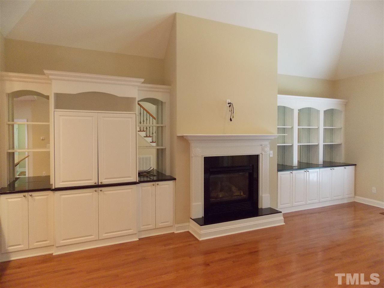 12233 Beestone Lane Raleigh, NC 27614 - Photo 7 of 25 a view of a livingroom with a fireplace