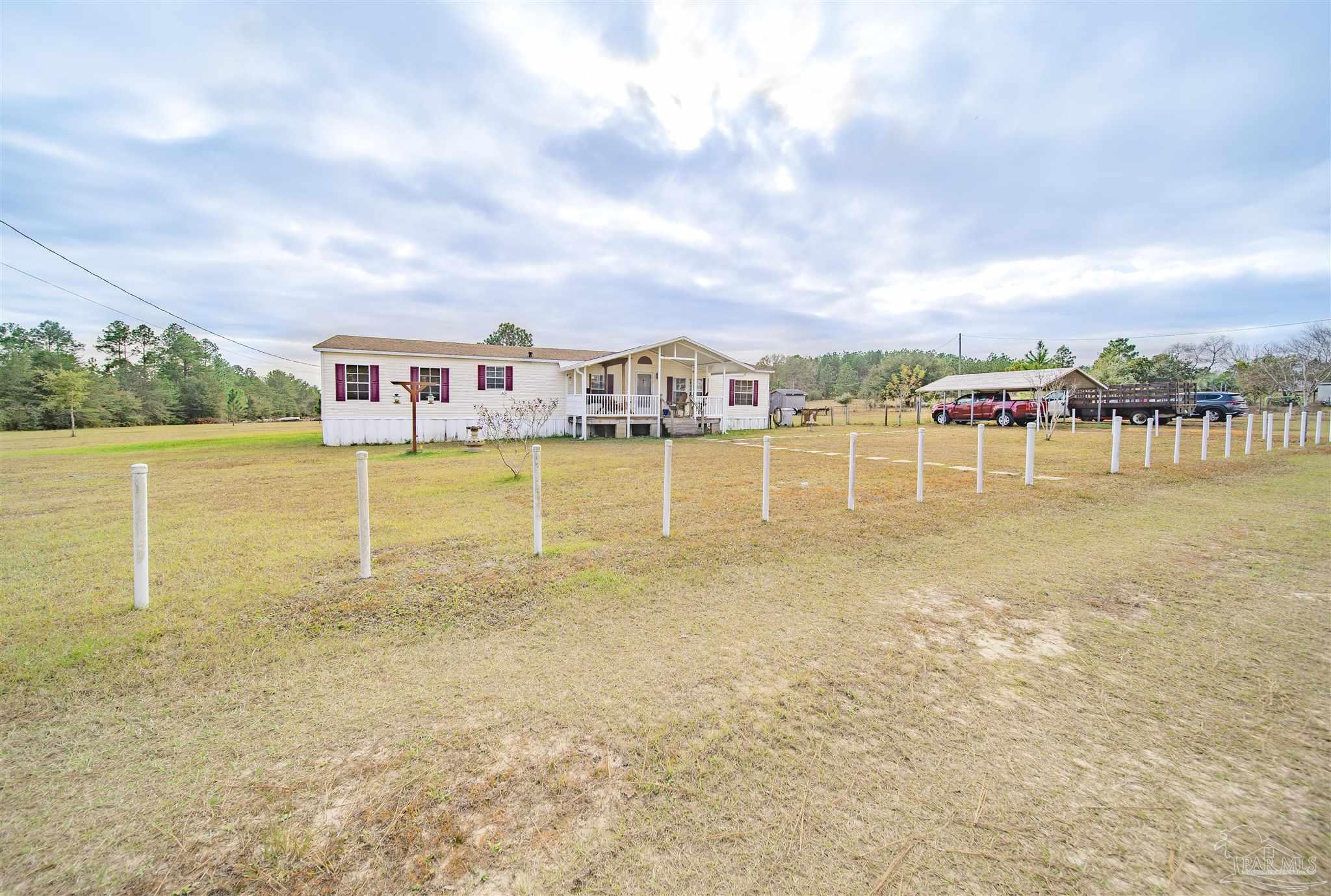 9875 American Farms Road Milton, FL 32583 - Photo 3 of 39