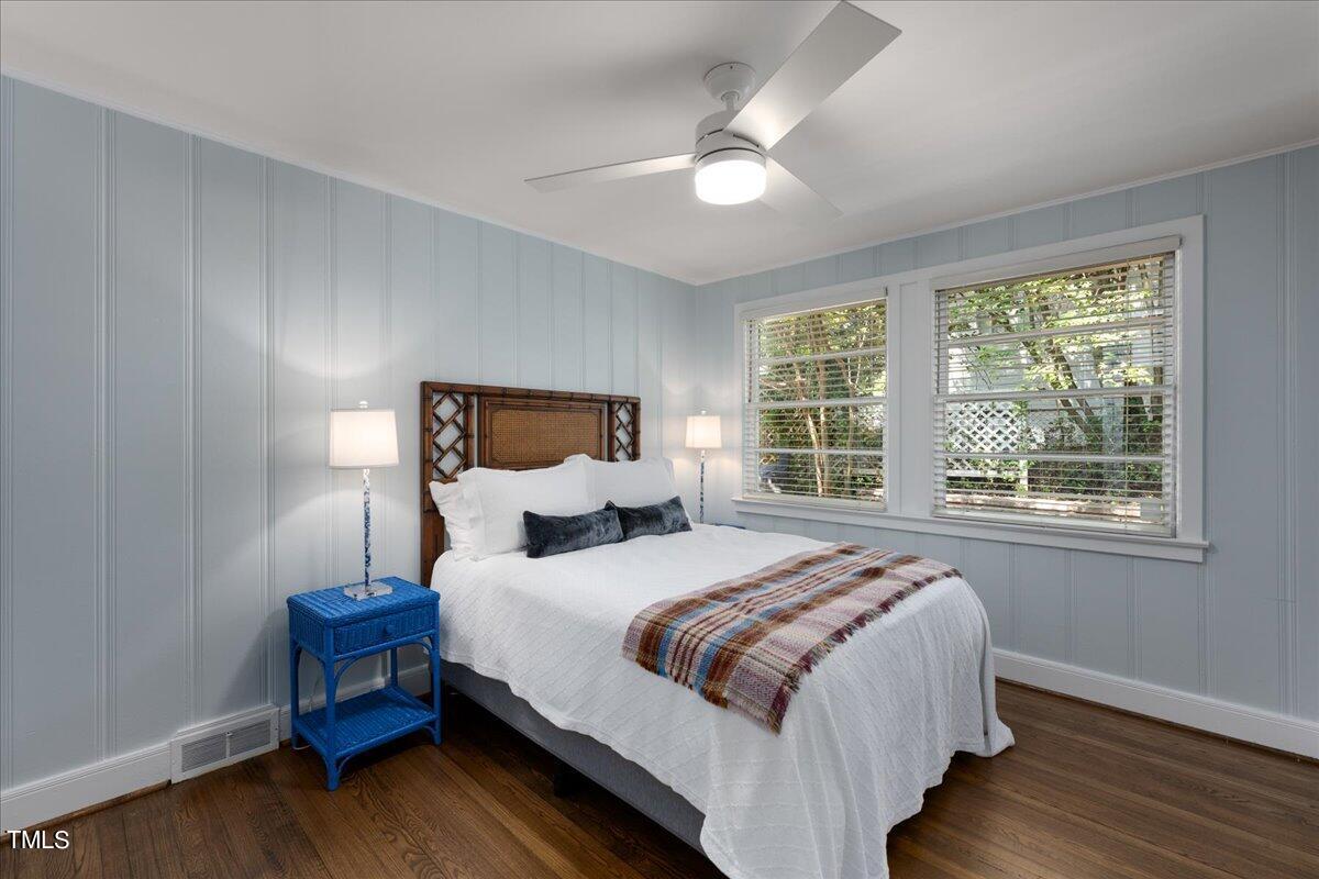 2803 Exeter Circle Raleigh, NC 27608 - Photo 24 of 38 a bedroom with a bed and a window