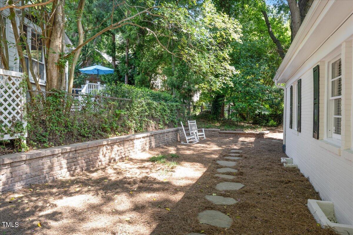 2803 Exeter Circle Raleigh, NC 27608 - Photo 31 of 38 a view of a yard with plants and trees