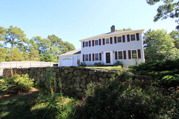 103 Snake Pond Road Sandwich, MA 02644 - Photo 1 of 4 a view of a building with a garden