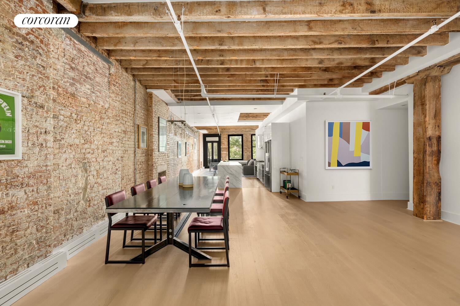 430 East 10th Street, Unit 2B Manhattan, NY 10009 - Photo 3 of 9 a dining room with furniture and wooden floor