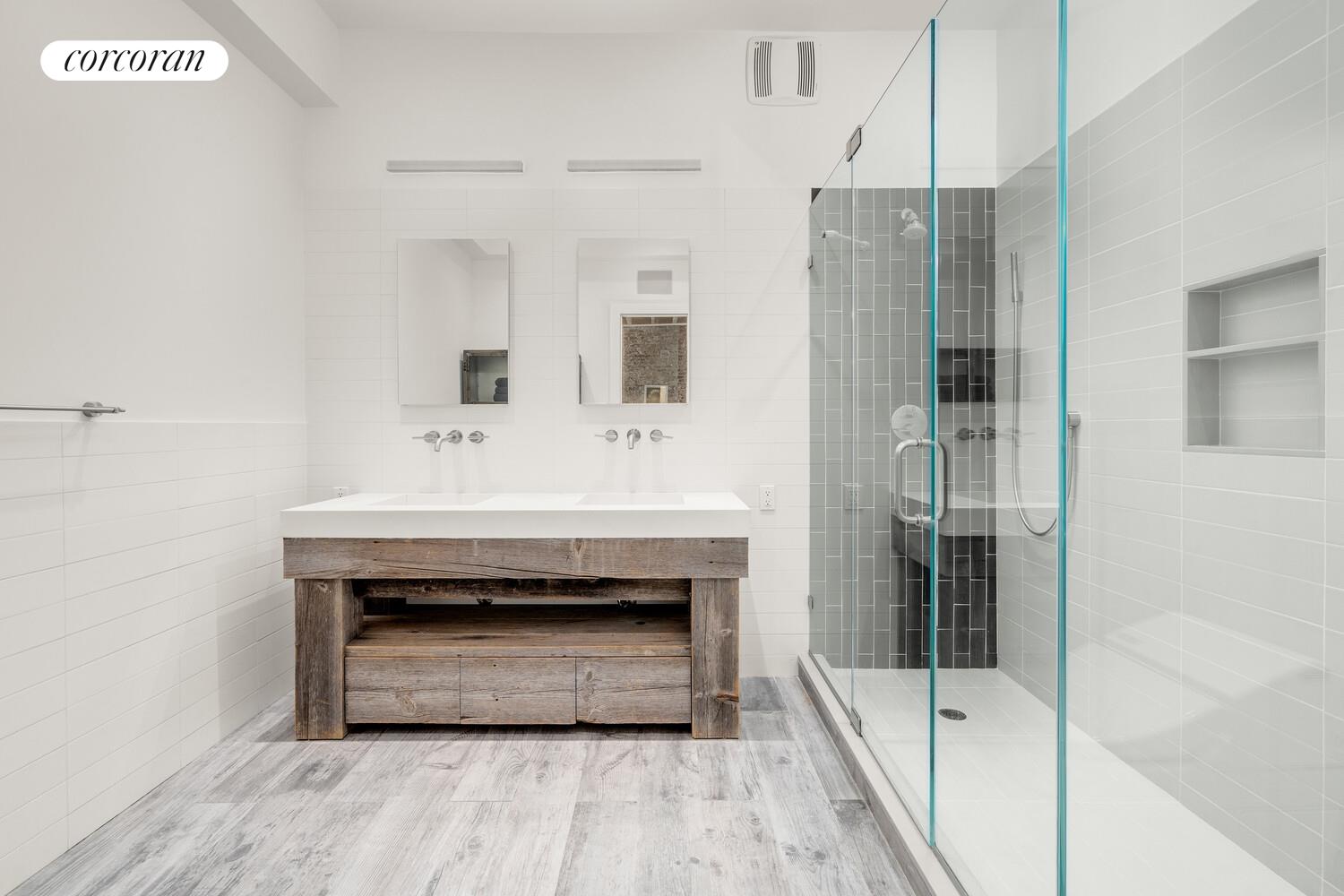 430 East 10th Street, Unit 2B Manhattan, NY 10009 - Photo 6 of 9 a bathroom with a sink and a mirror