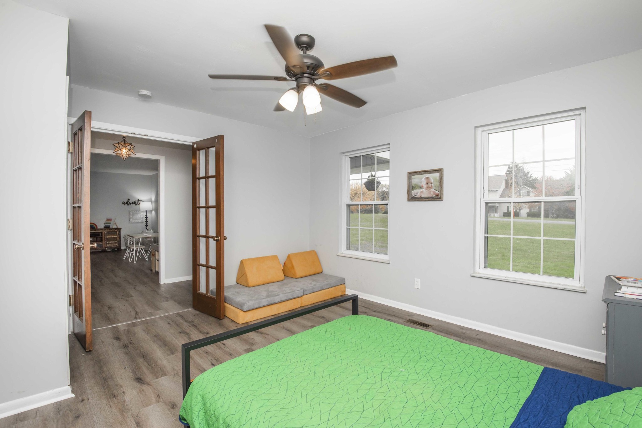 395 Mountain View Road Lenoir City, TN 37771 - Photo 32 of 34 a room with window and a ceiling fan