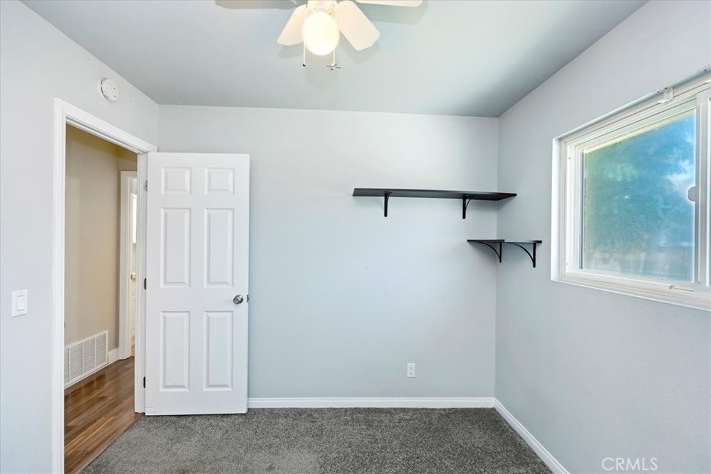 3112 Glenn Road Oceanside, CA 92056 - Photo 23 of 30 wooden floor in an empty room with a window
