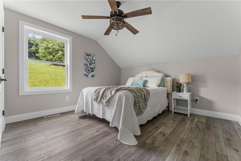 2460 Chapel Road Beaver, PA 15009 - Photo 30 of 42 a bedroom with a bed and a window