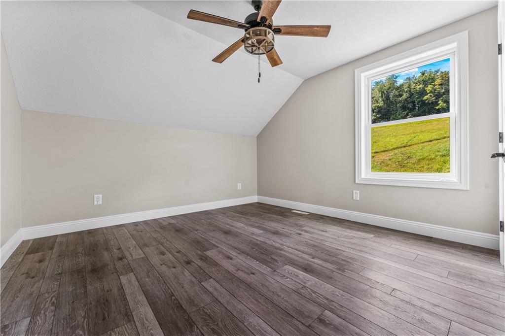 2460 Chapel Road Beaver, PA 15009 - Photo 32 of 42 wooden floor in an empty room with a window