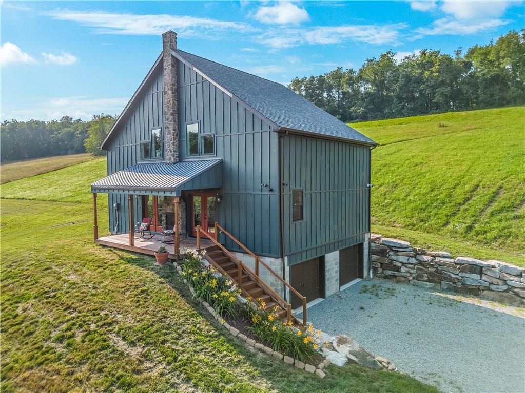 2460 Chapel Road Beaver, PA 15009 - Photo 41 of 42 a view of a house with backyard and sitting area