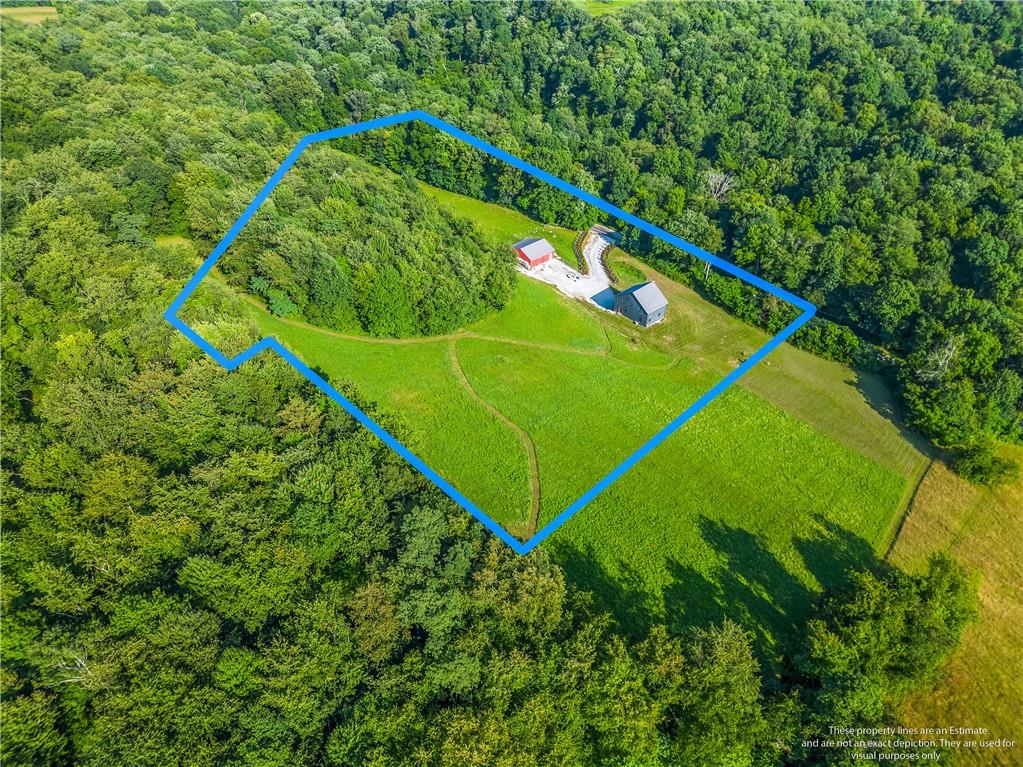 2460 Chapel Road Beaver, PA 15009 - Photo 5 of 42 a green field with lots of bushes