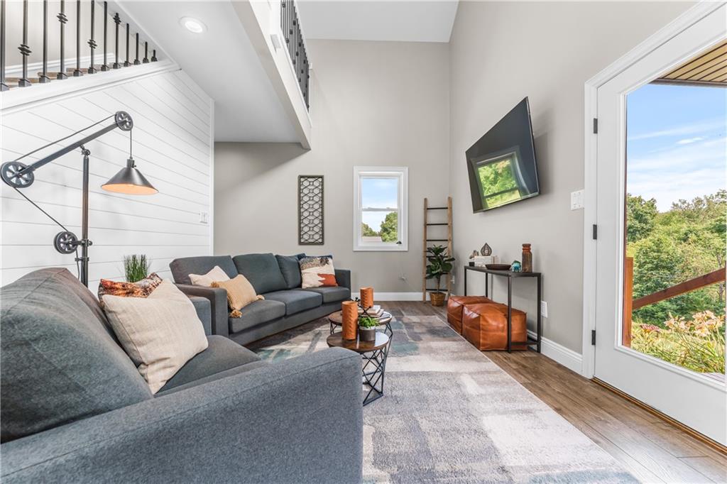 2460 Chapel Road Beaver, PA 15009 - Photo 9 of 42 a living room with furniture and a flat screen tv