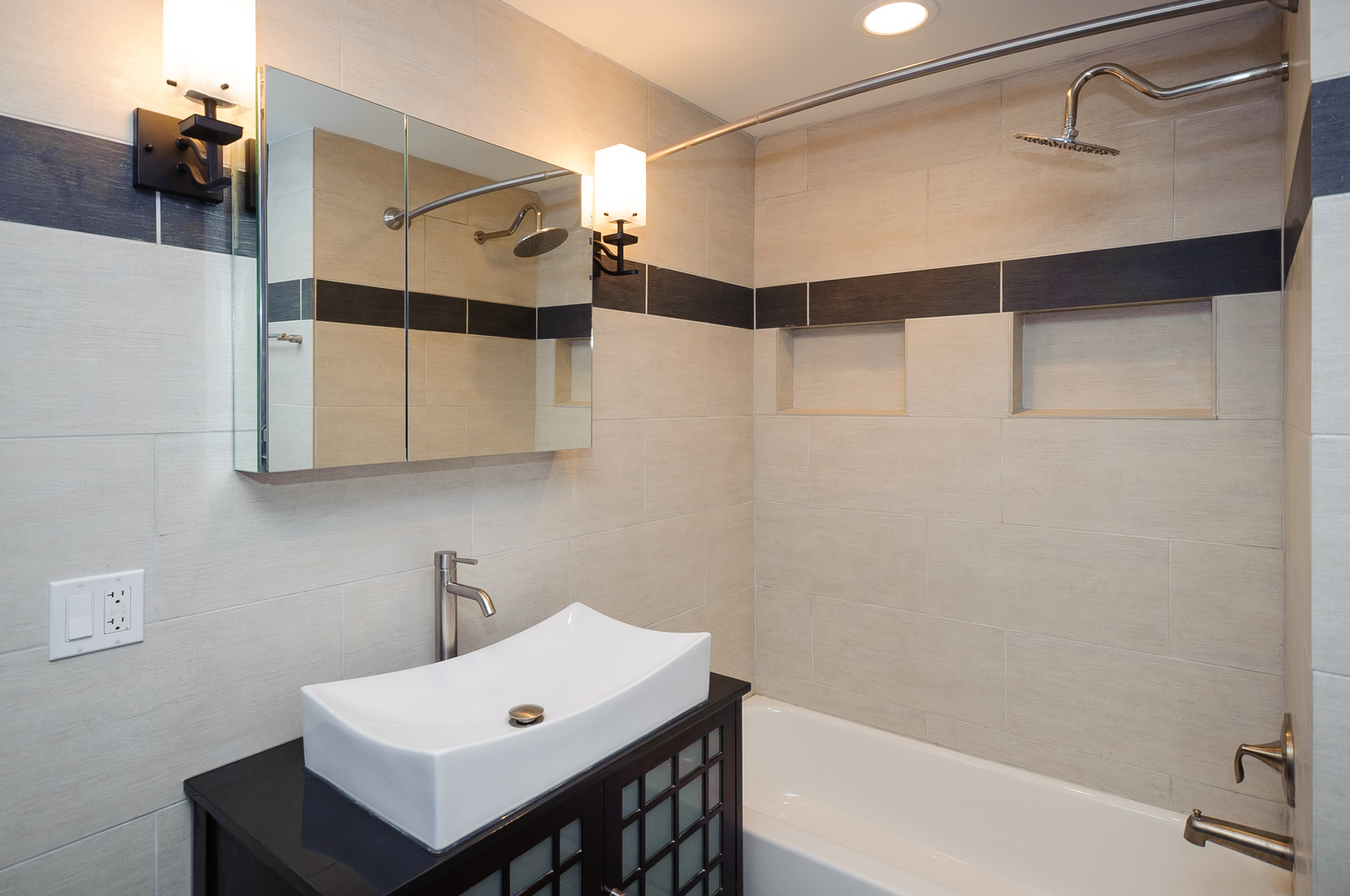2155 West Potomac Avenue, Unit GDN Chicago, IL 60622 - Photo 8 of 16 a bathroom with a sink and mirror