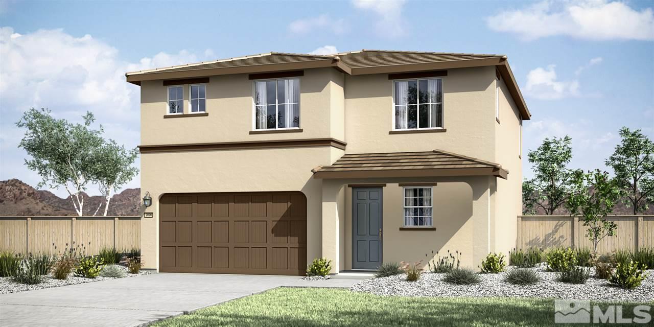 9741 Pachuca Drive Reno, NV 89521 - Photo 1 of 1 a front view of a house with a yard garage and outdoor seating