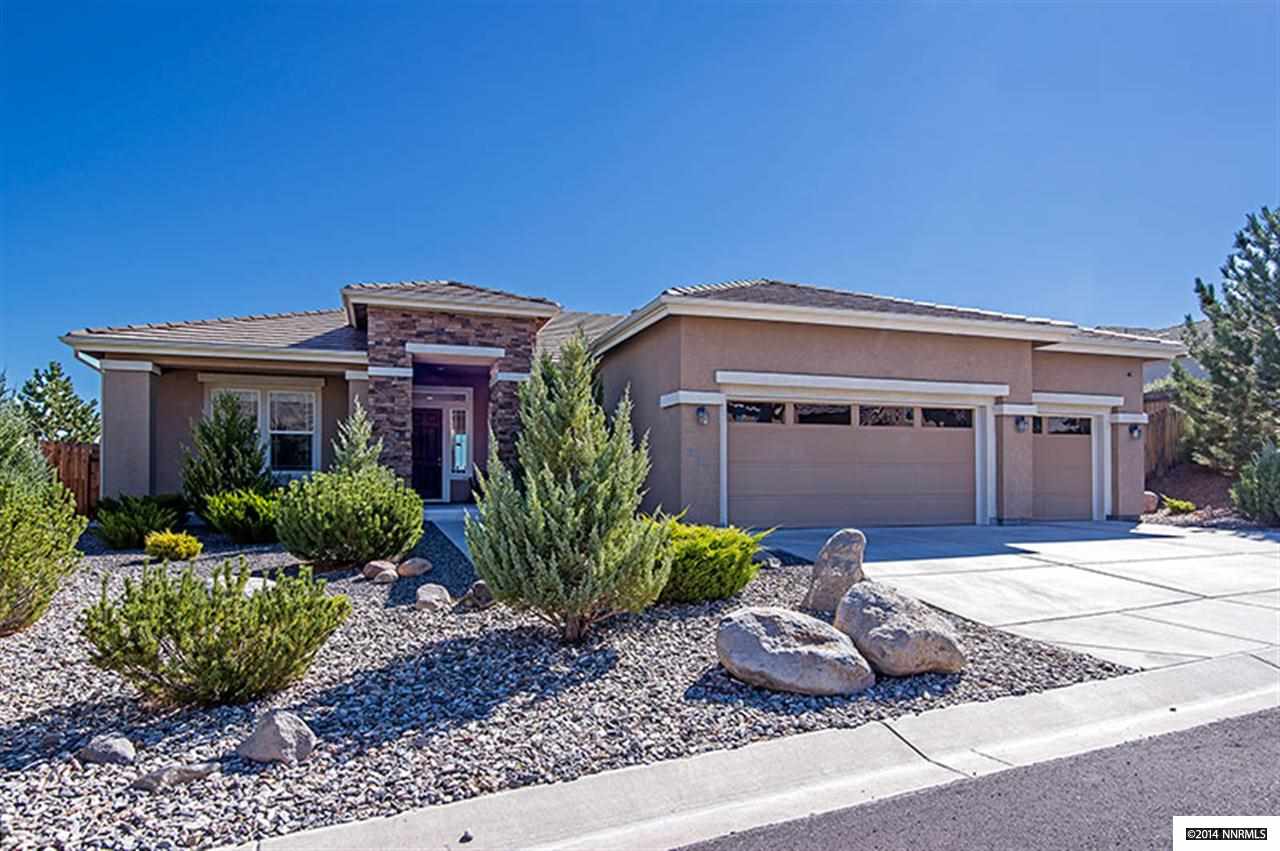612 Rabbit Ridge Court Reno, NV 89511 - Photo 1 of 1 a view of a house with a garden