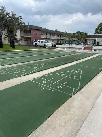 a view of a big building with a big yard