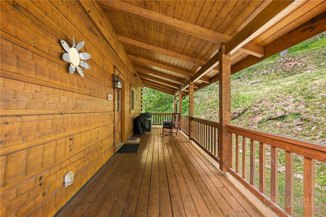 613 Silas Creek Road Lansing, NC 28643 - Photo 27 of 40 a view of balcony with wooden floor