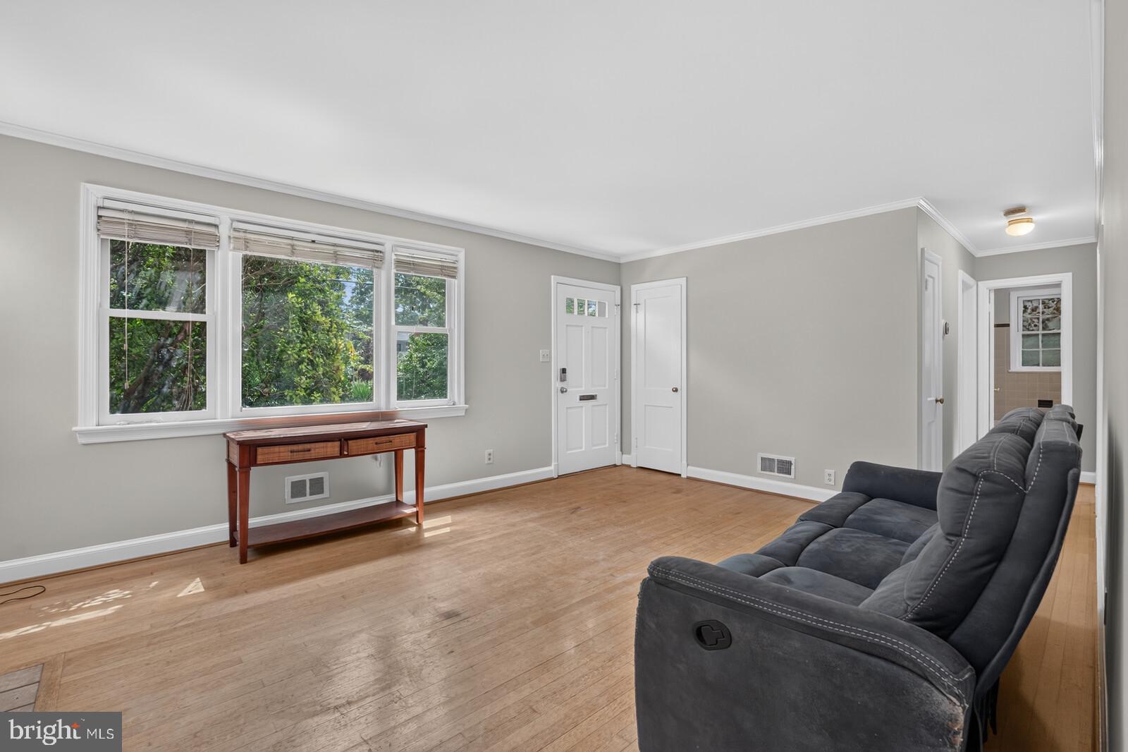 2713 Plyers Mill Road Silver Spring, MD 20902 - Photo 7 of 41 Living room has hardwood floors, coat closet