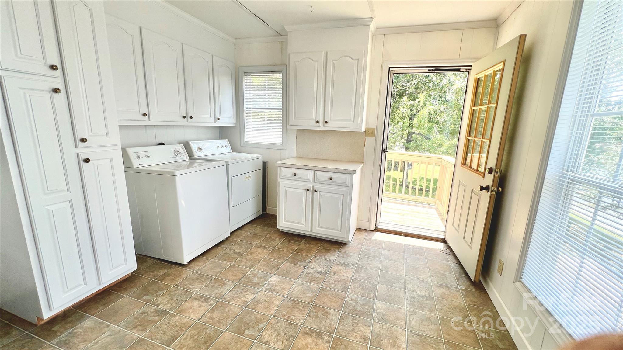 2298 Singleton Creek Road Liberty Hill, SC 29074 - Photo 14 of 21 a view of a kitchen with white cabinets and a sink