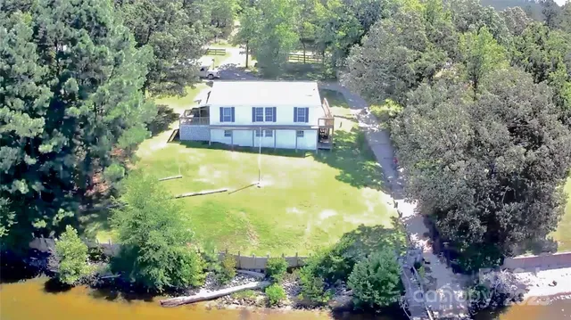 a brick building with a yard