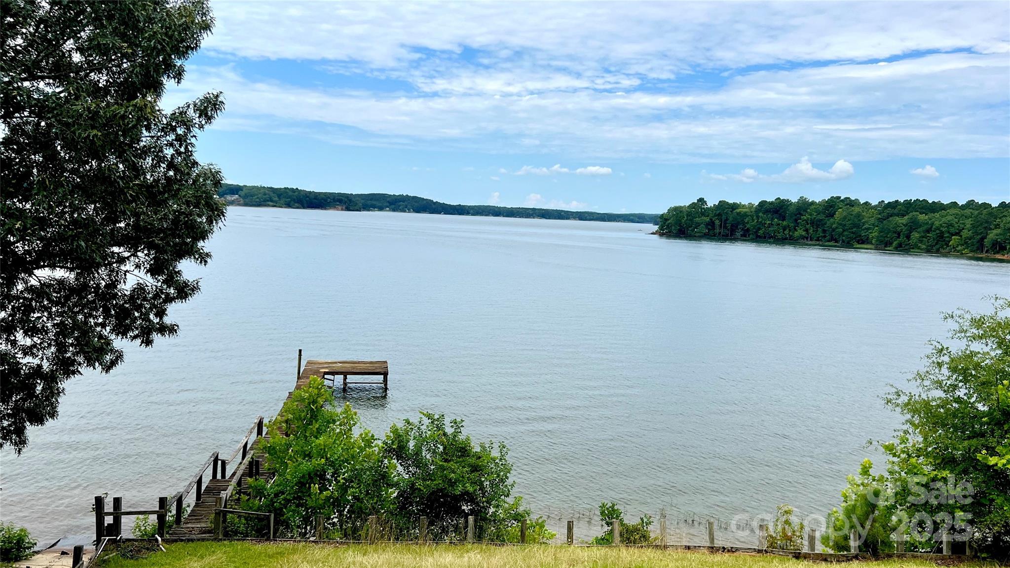 2298 Singleton Creek Road Liberty Hill, SC 29074 - Photo 19 of 21 a view of a lake from a yard