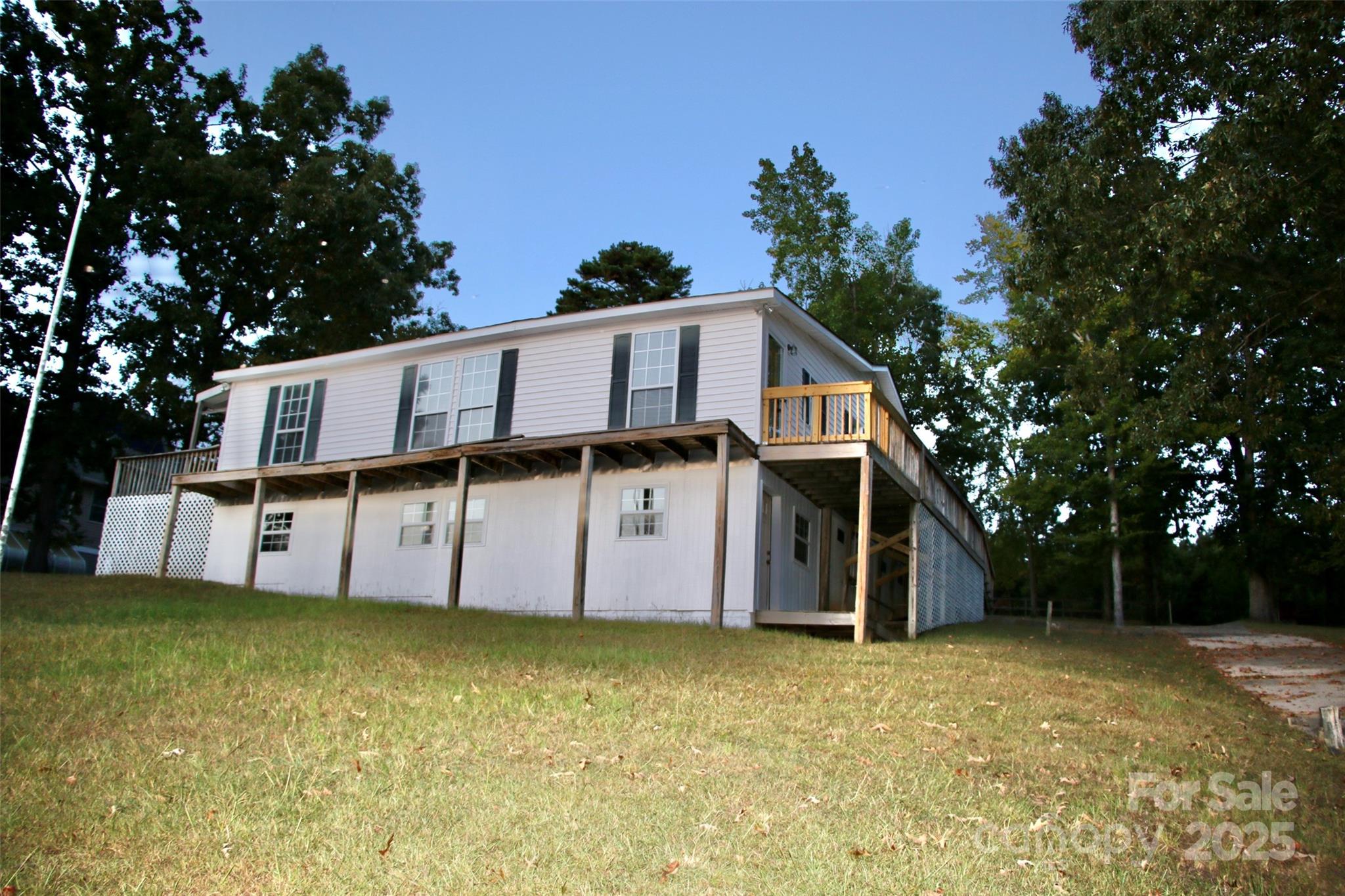 2298 Singleton Creek Road Liberty Hill, SC 29074 - Photo 3 of 21 a view of a house with a backyard