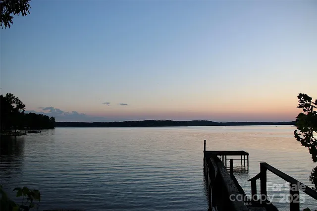 a view of a porch with a fence