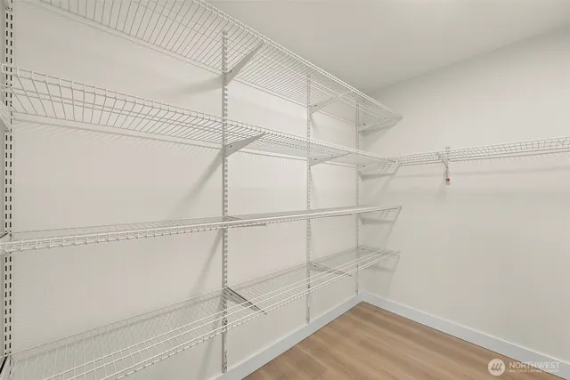a view of a room with racks on the wall