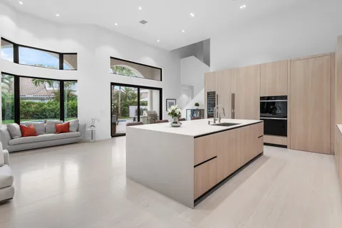 a utility room with sink dryer and washer