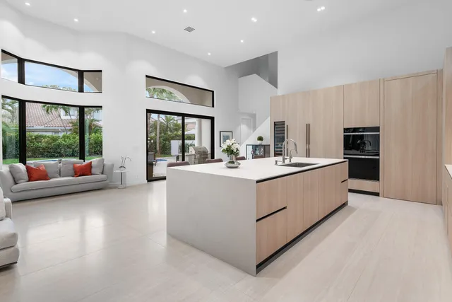 a utility room with sink dryer and washer