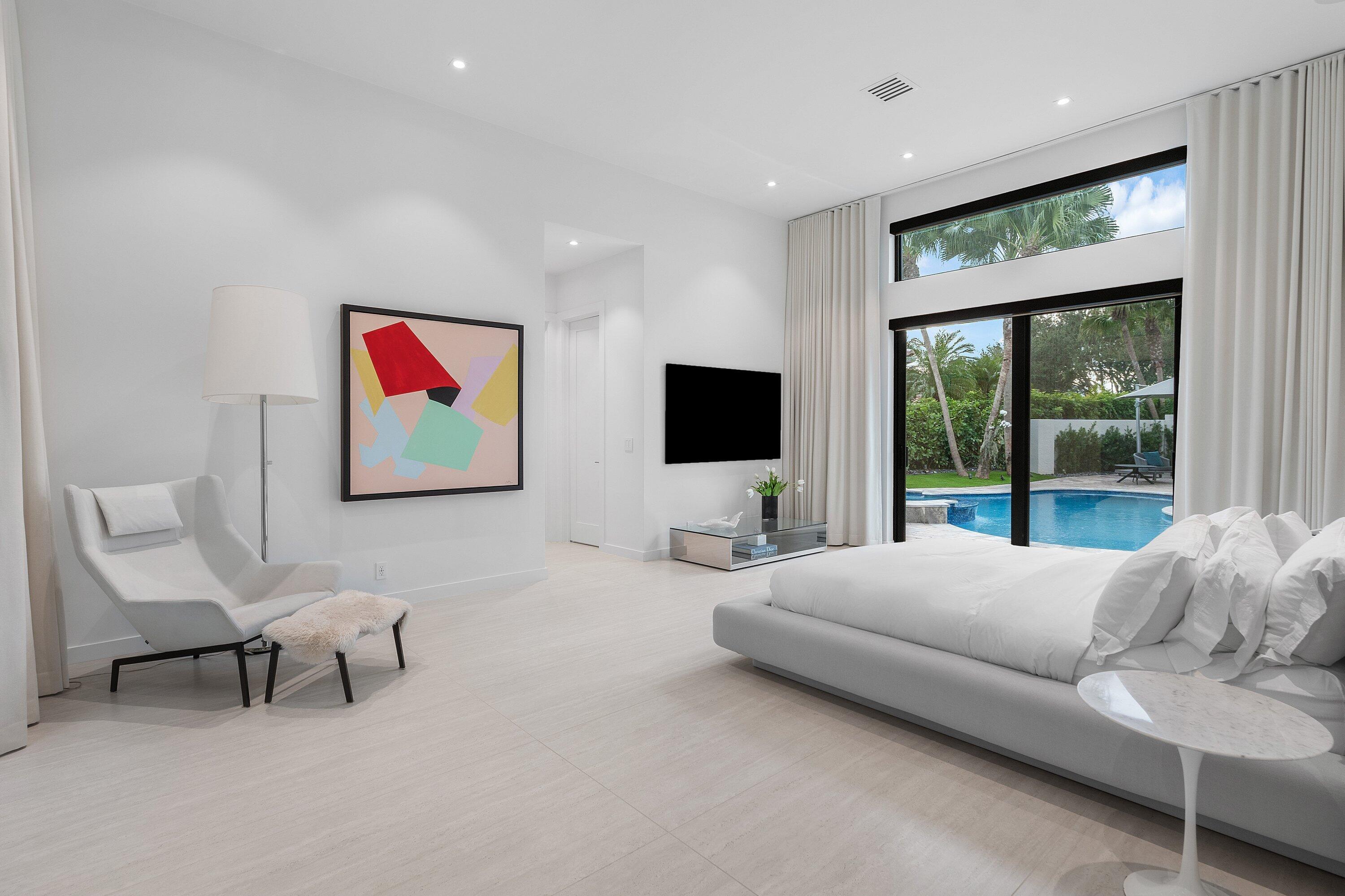 6026 Northwest 31st Way Boca Raton, FL 33496 - Photo 22 of 61 a living room with furniture and a flat screen tv