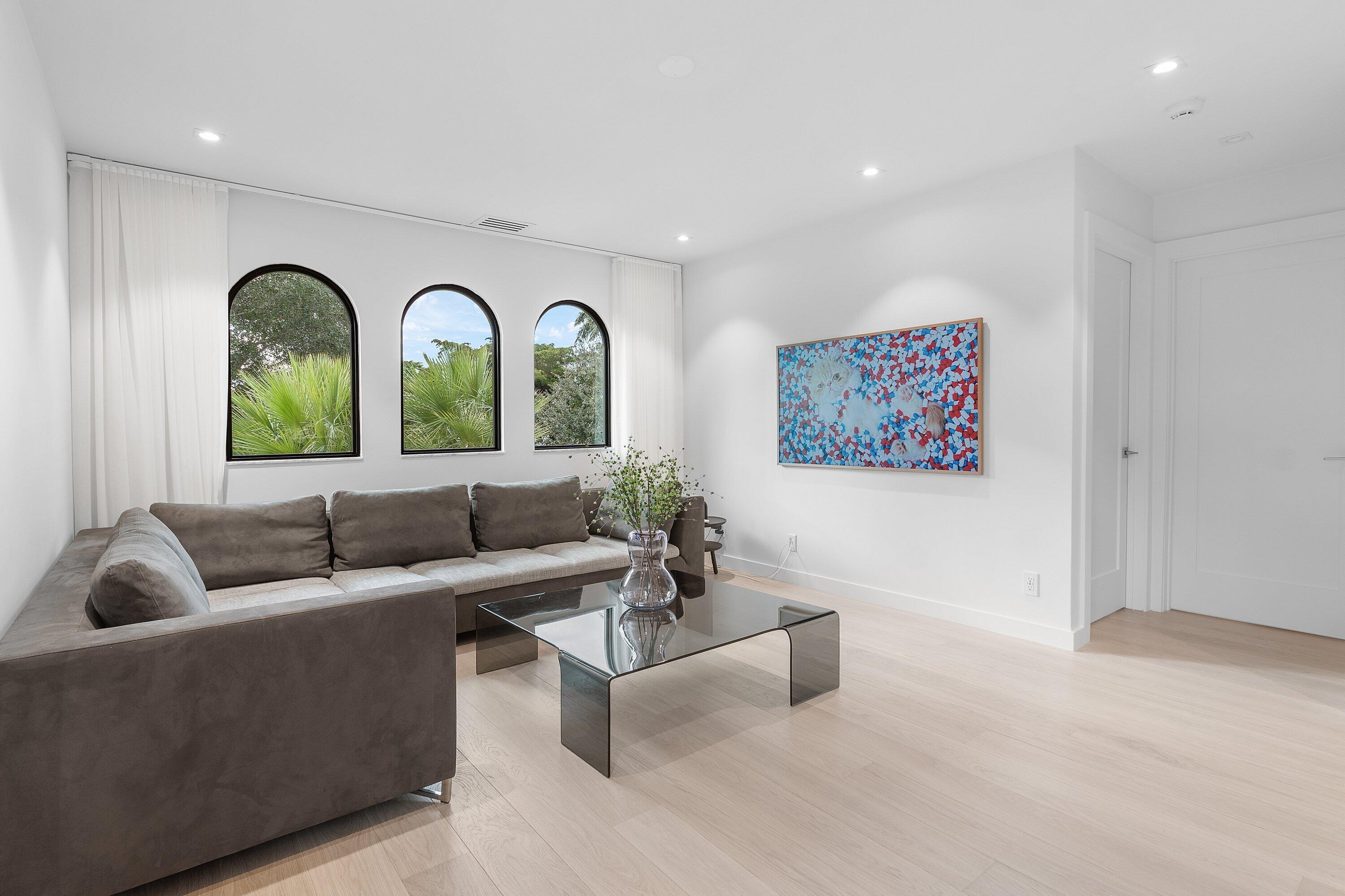 6026 Northwest 31st Way Boca Raton, FL 33496 - Photo 35 of 61 a living room with furniture and a large window