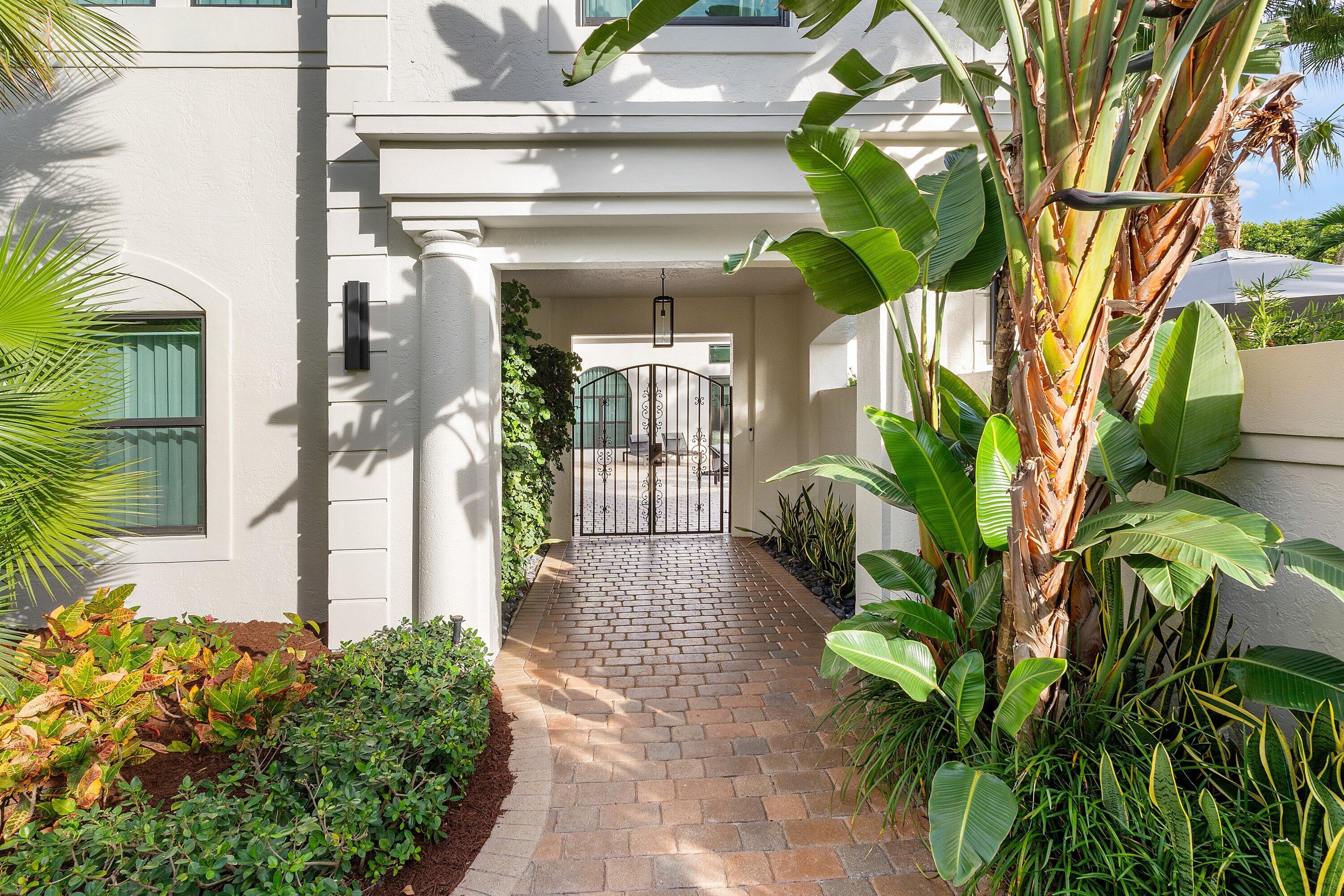 6026 Northwest 31st Way Boca Raton, FL 33496 - Photo 4 of 61 a plant is in front of building