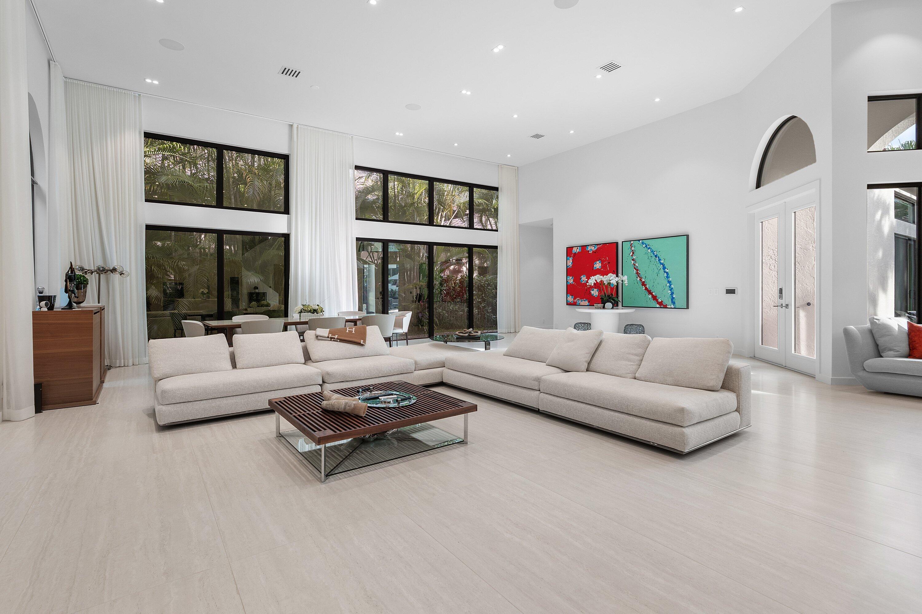 6026 Northwest 31st Way Boca Raton, FL 33496 - Photo 9 of 61 a living room with furniture and a large window