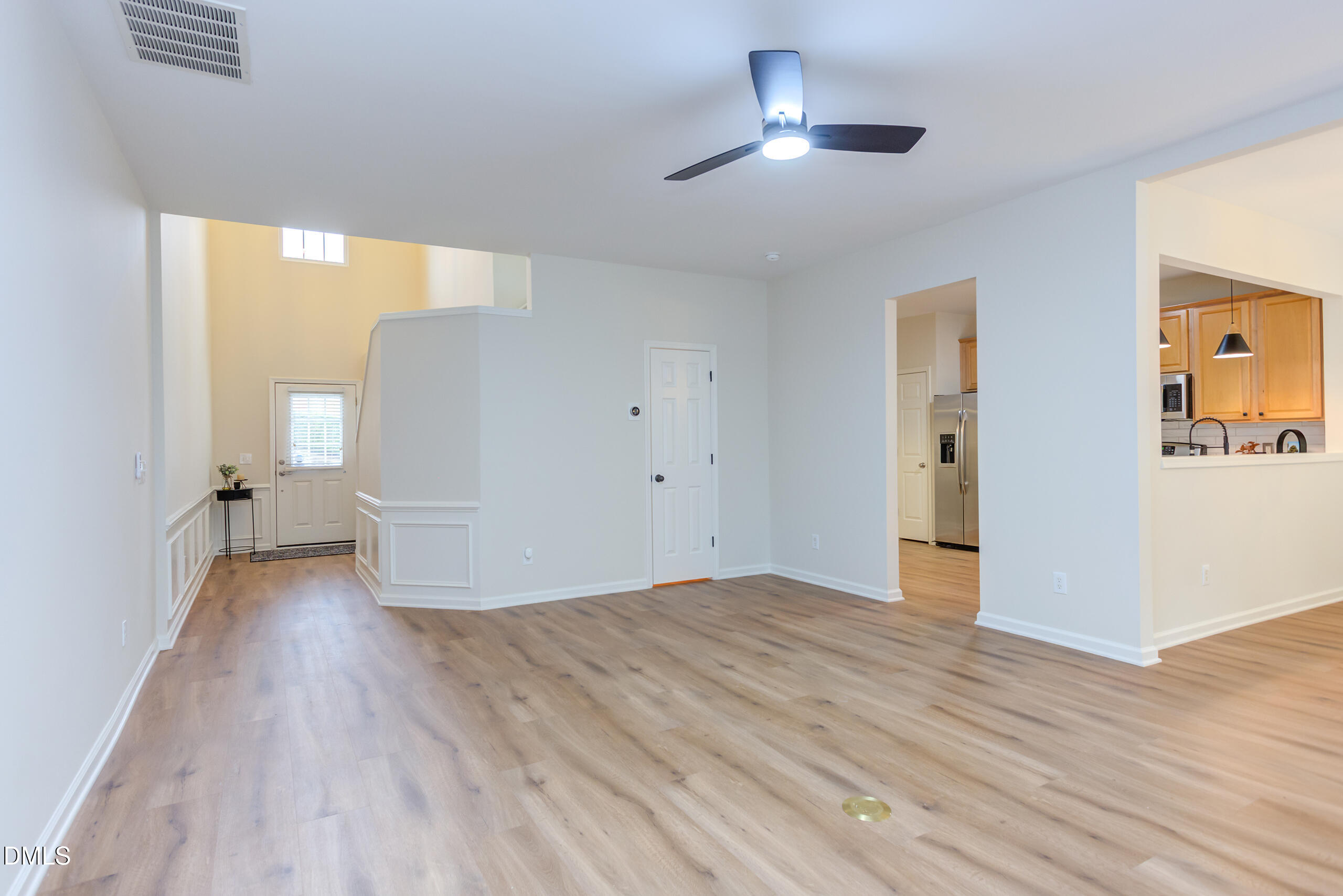 5620 Berry Creek Circle Raleigh, NC 27613 - Photo 12 of 38 a view of empty room with wooden floor