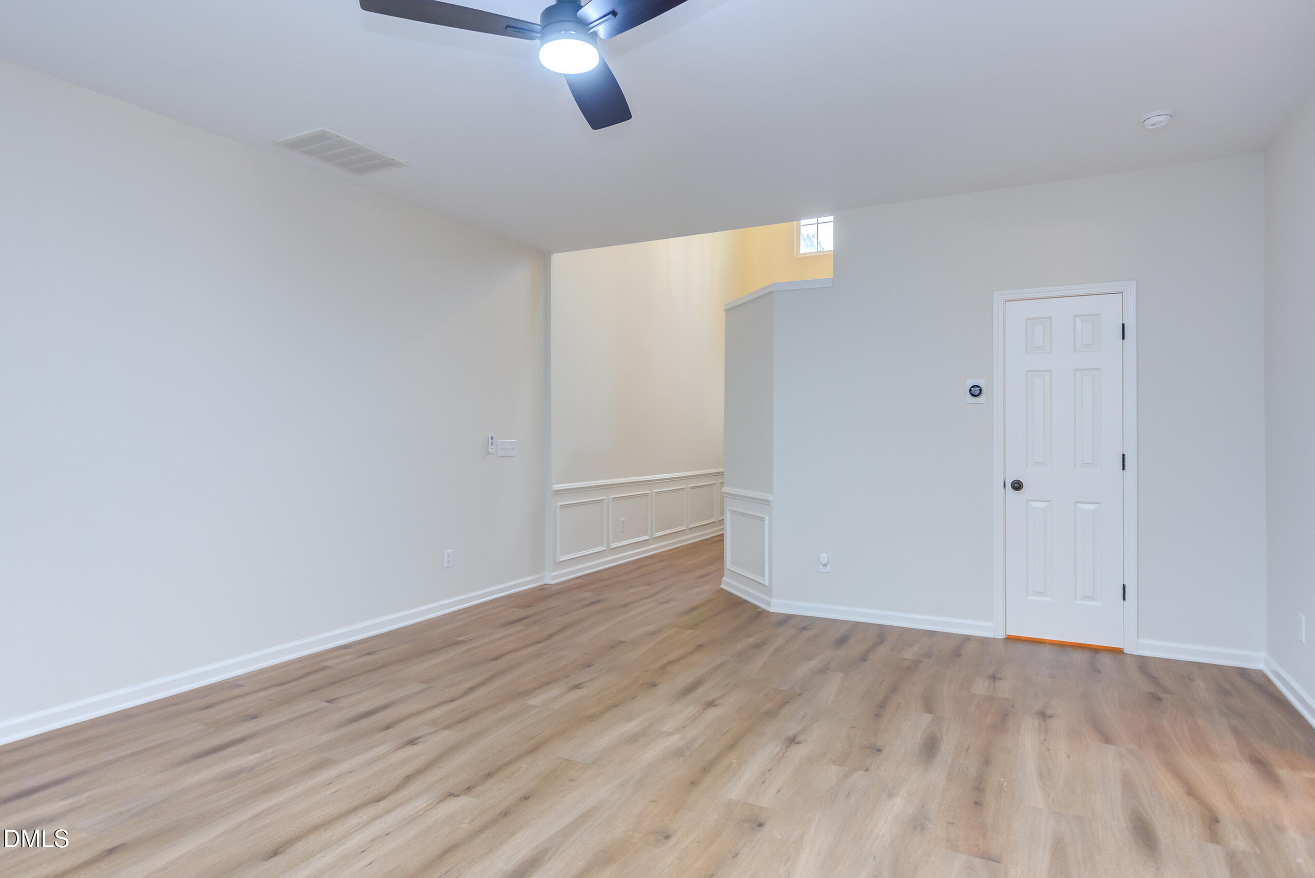 5620 Berry Creek Circle Raleigh, NC 27613 - Photo 17 of 38 wooden floor in an empty room