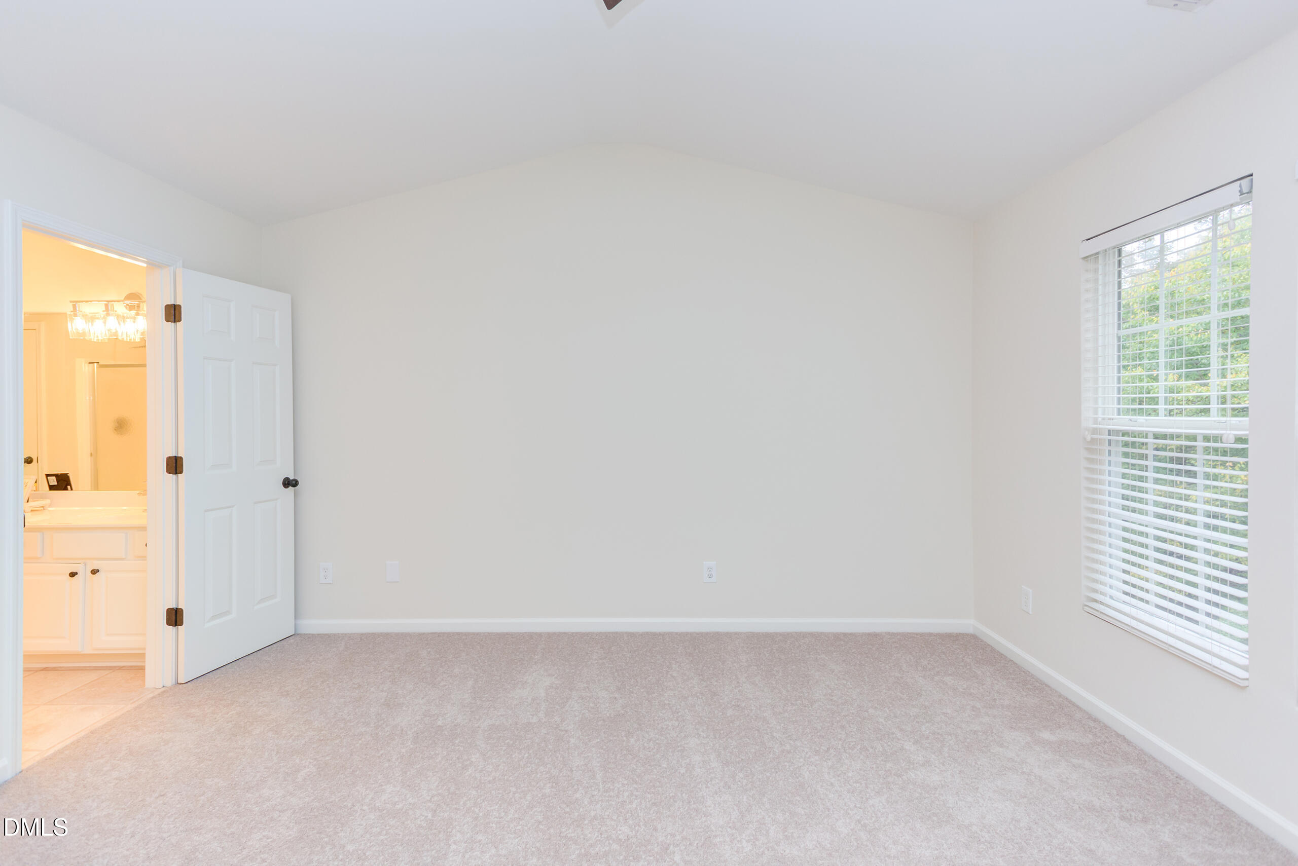 5620 Berry Creek Circle Raleigh, NC 27613 - Photo 18 of 38 a view of an empty room and a window