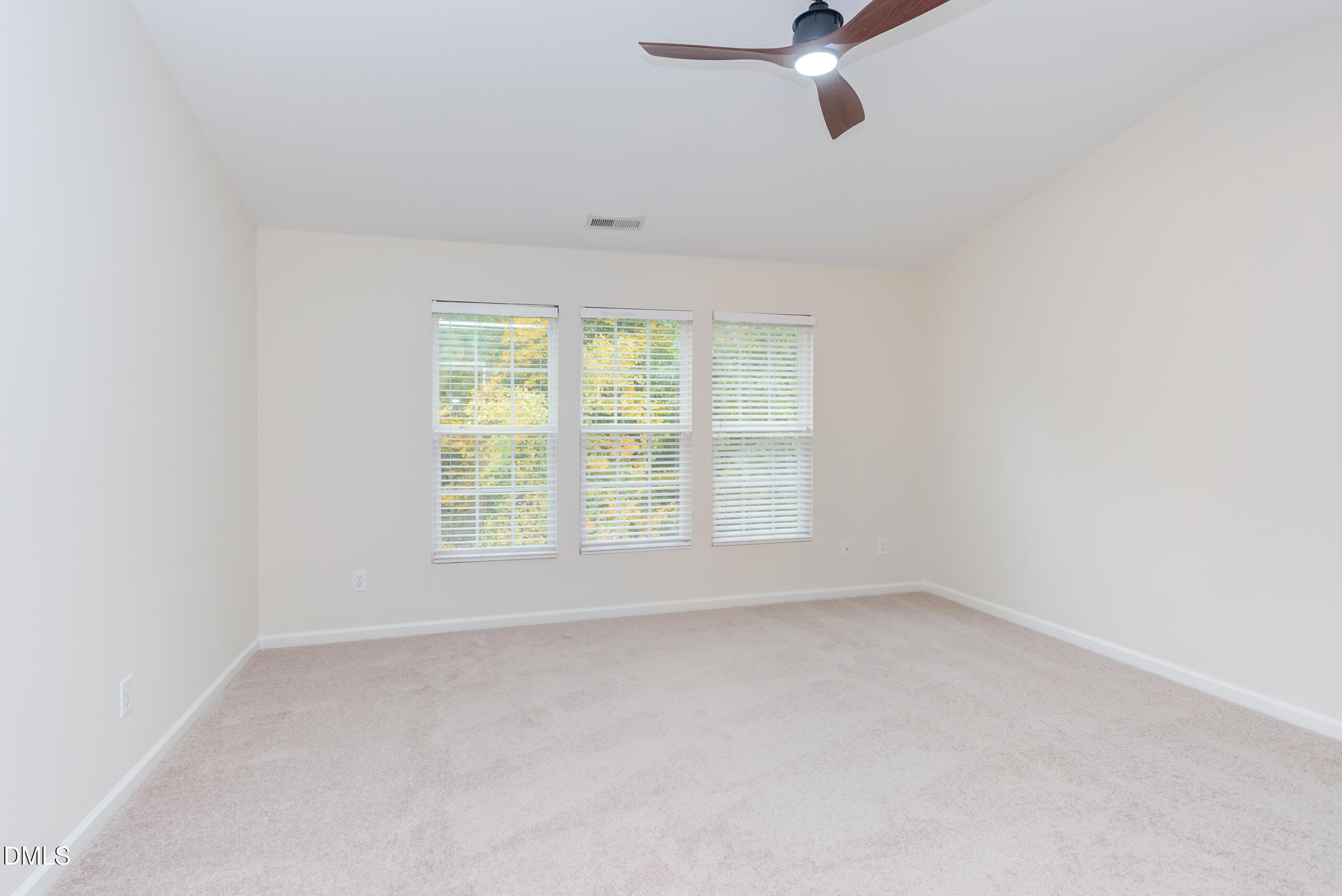 5620 Berry Creek Circle Raleigh, NC 27613 - Photo 20 of 38 an empty room with a window