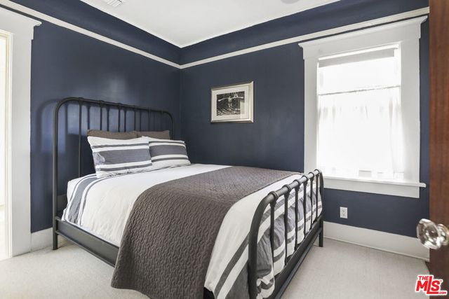 a room with furniture and a window