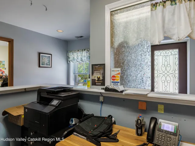 a kitchen with a sink and a stove top oven
