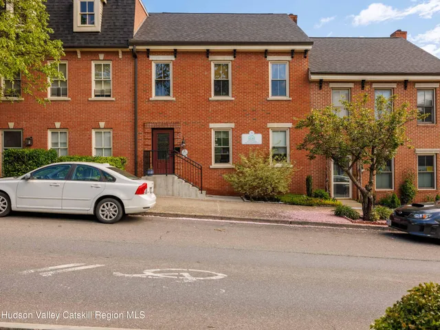 a car parked in front of a house