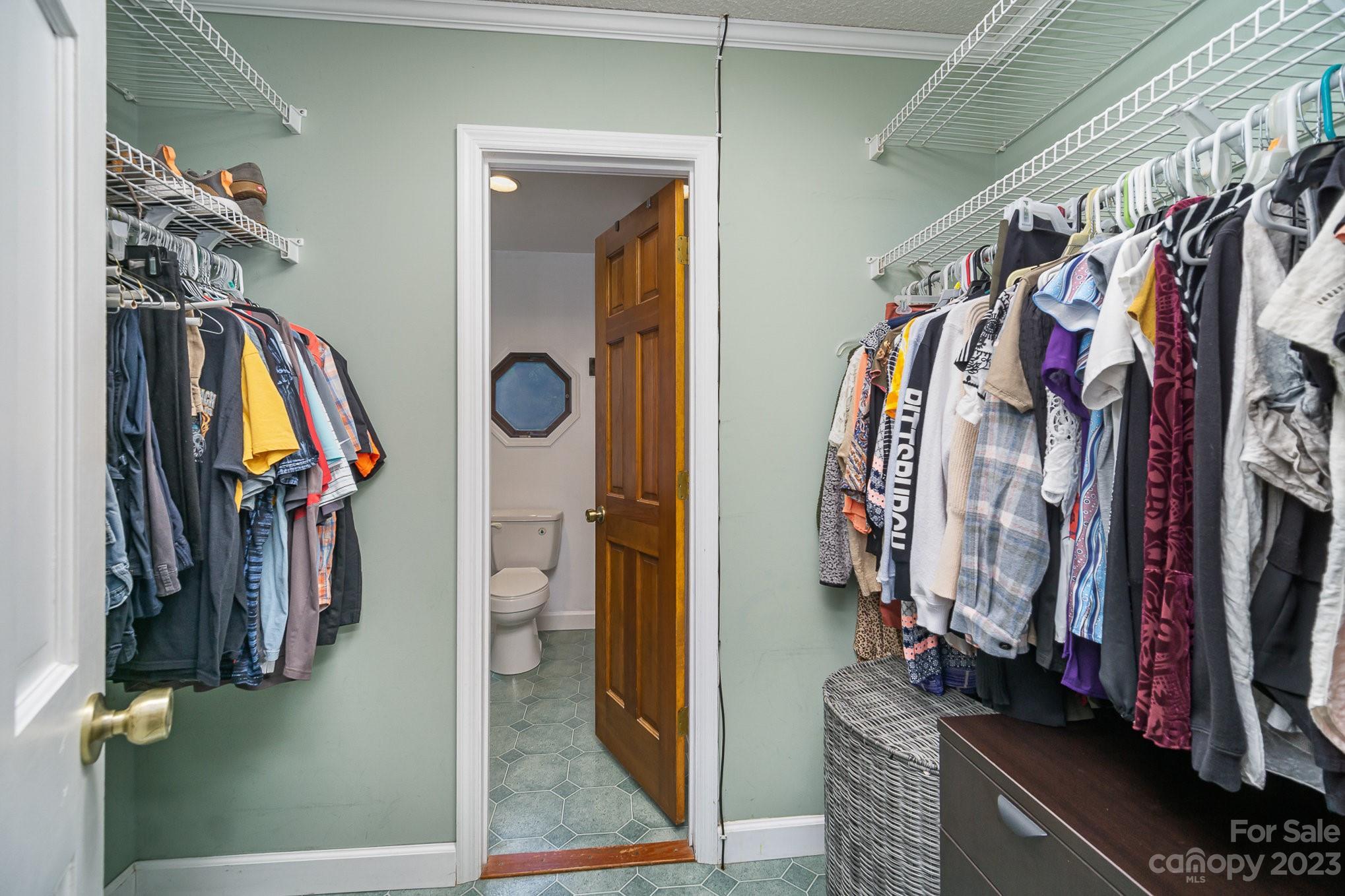 427 Laurel Hills Road Indian Land, SC 29707 - Photo 15 of 32 a view of walk in closet with clothes