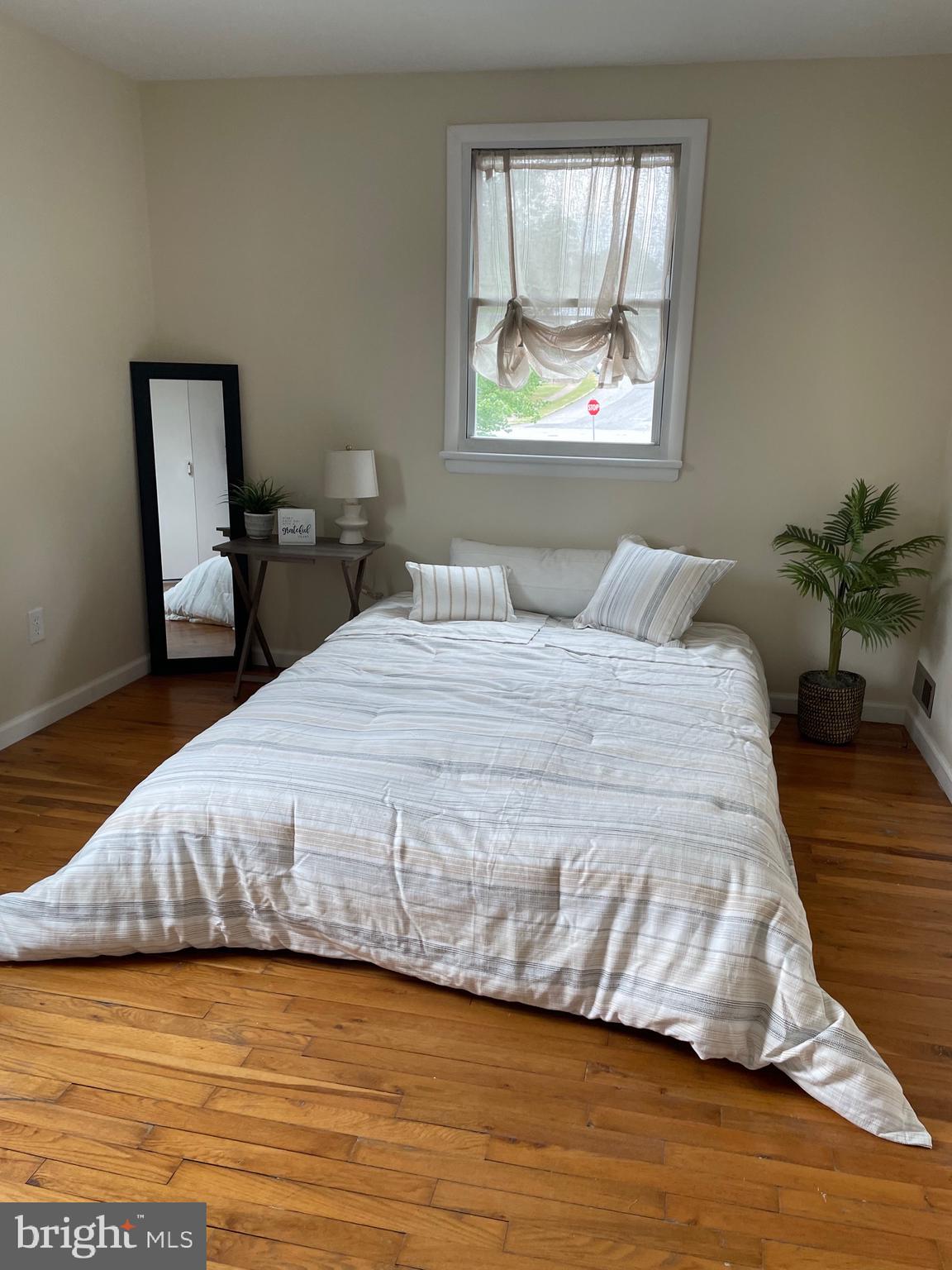 762 Erford Road Camp Hill, PA 17011 - Photo 12 of 25 a bedroom with a bed and a window