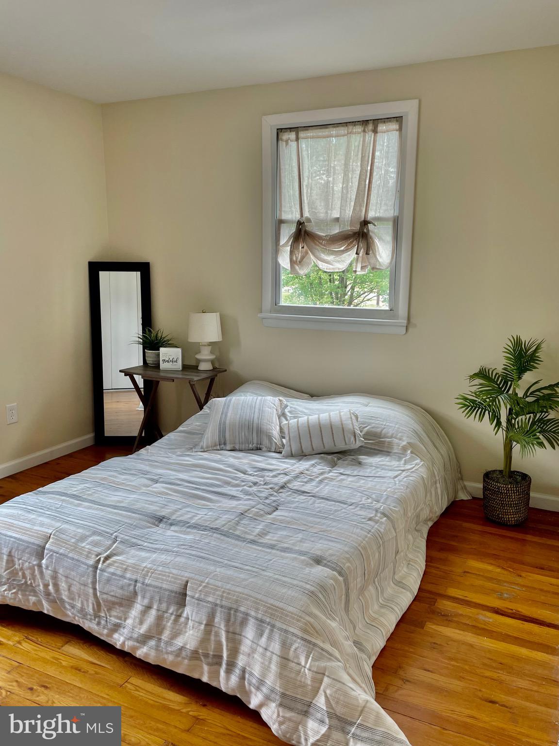762 Erford Road Camp Hill, PA 17011 - Photo 13 of 25 a bedroom with a bed table and window