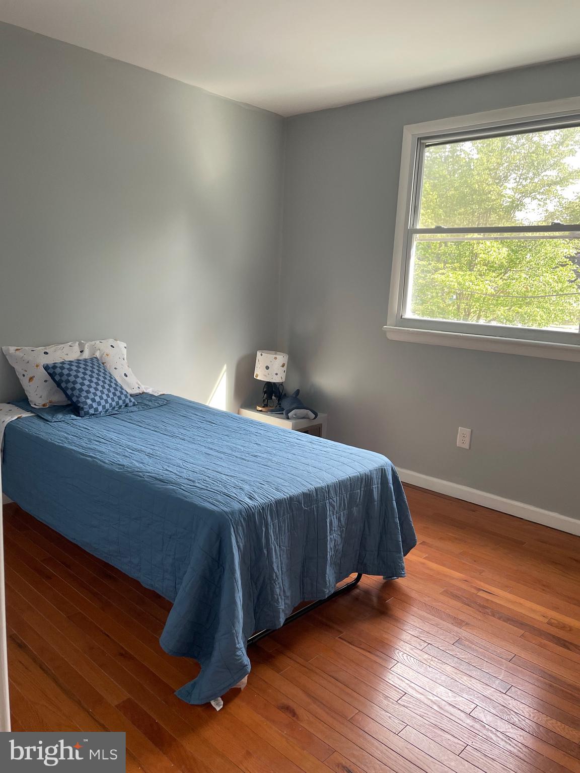 762 Erford Road Camp Hill, PA 17011 - Photo 3 of 25 a bed sitting in a bedroom next to a window